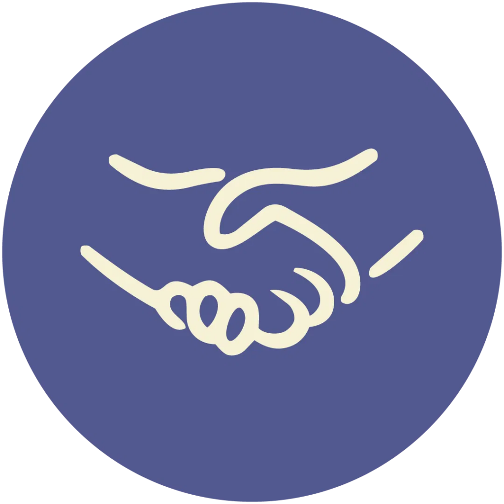 Two hands shaking in a clean workspace to symbolize partnership and alignment between a leader and team.